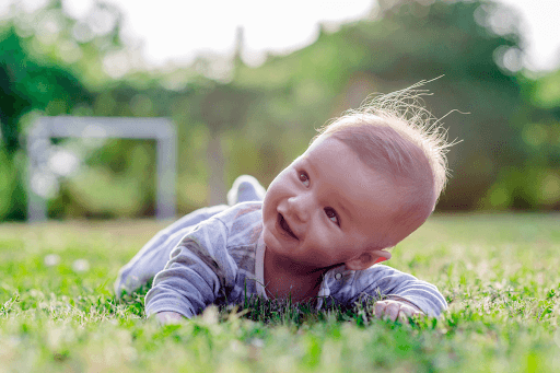 Baby enjoying tummy time outside