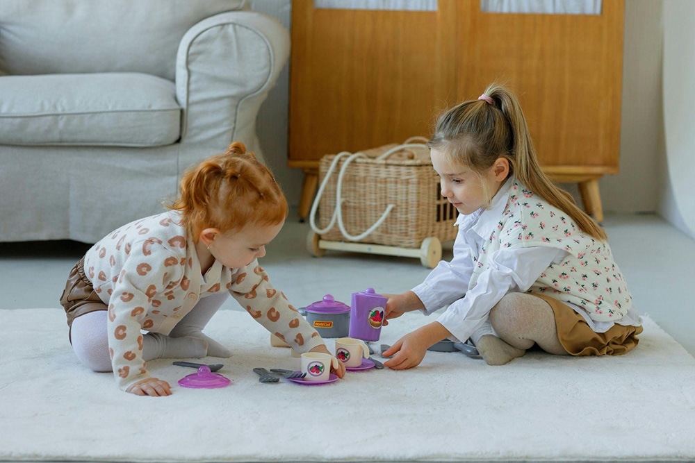 two children playing with toys