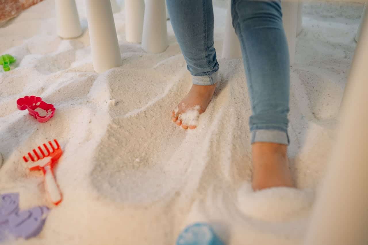 child walking in sand